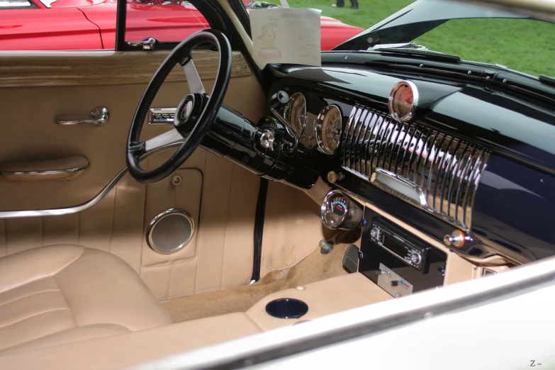 the interior of a classic car from the fifties