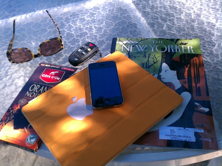 a pile of electronics on top of each other on a table