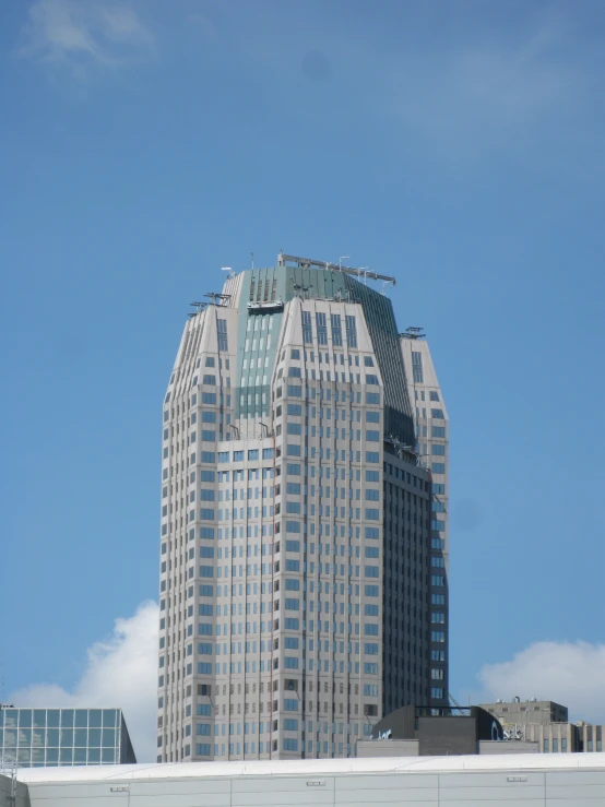 skyscrs in the distance against a blue sky