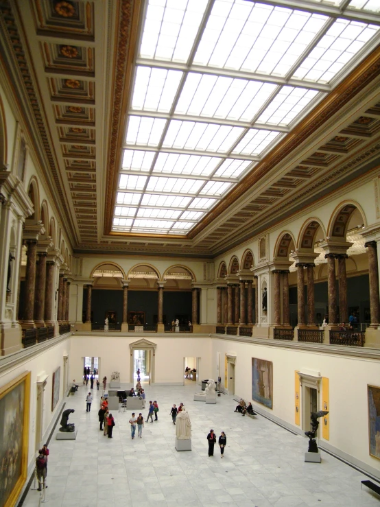 the view of the inside of an old building with people and other objects