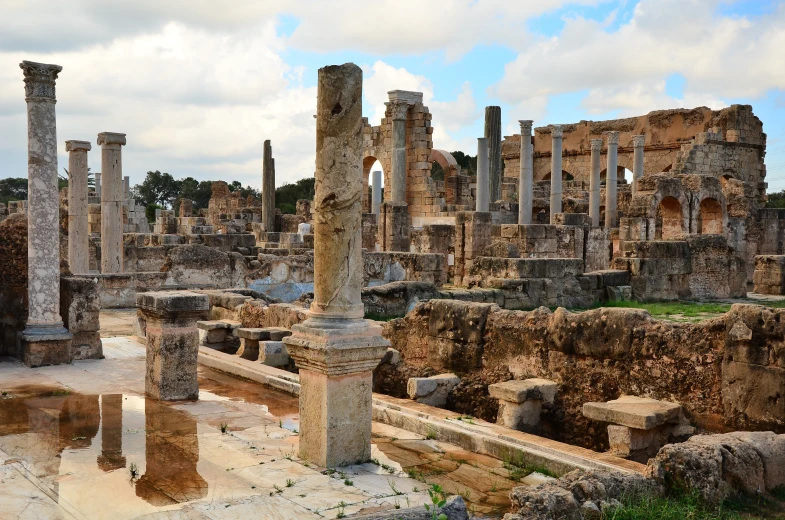 a ruins, some pillars and pillars on the floor