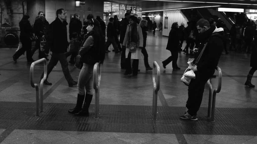 several people are waiting for their turn to board