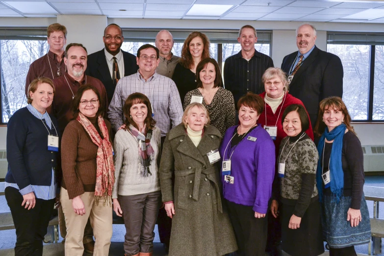 a group of people posing for a po together