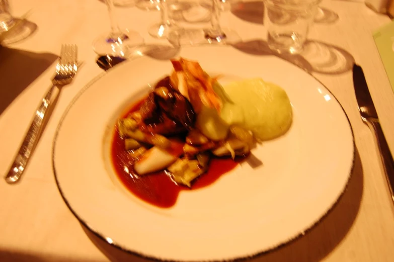 a white plate filled with food on top of a table