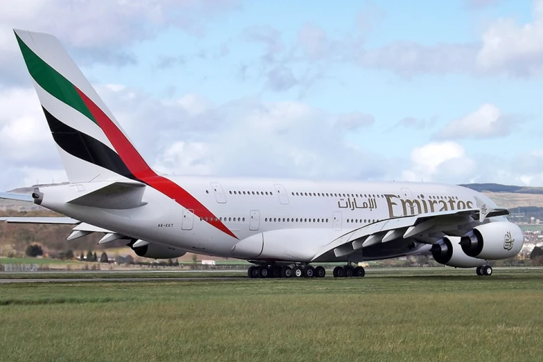 a large commercial air plane on a runway