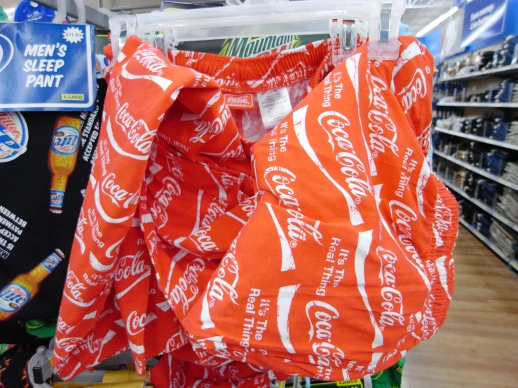 this is a coca cola can printed wrapper on a store shelf