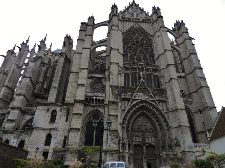 an old gothic looking church, with lots of windows