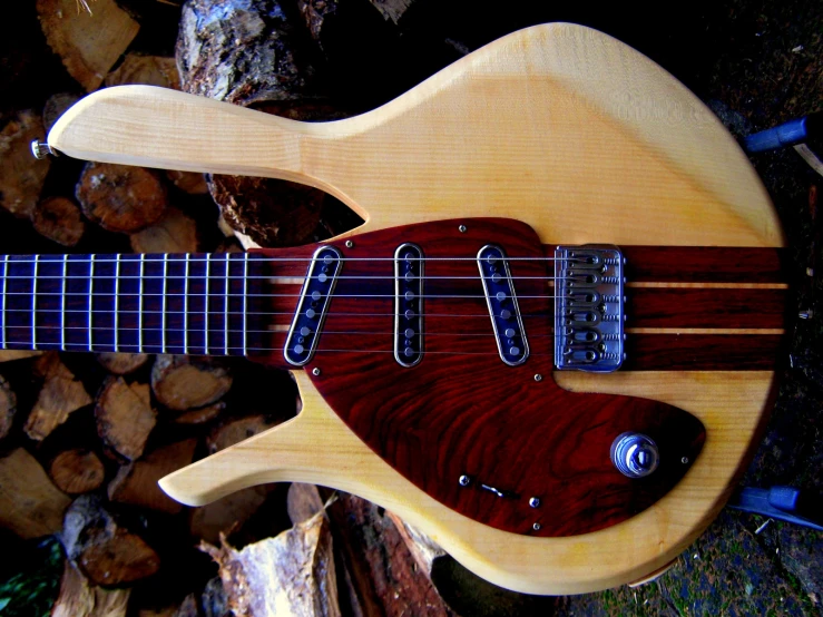 an electric bass guitar with a nice wooden body