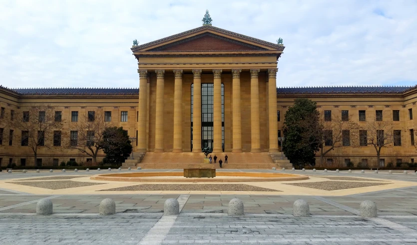 a building that has a large fountain in front