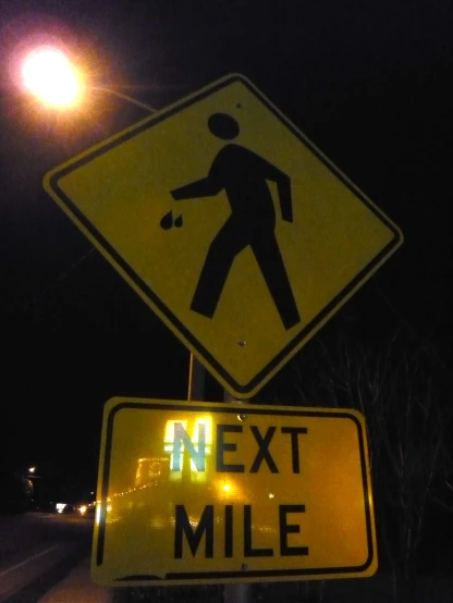 a traffic sign stating a crossing for a person