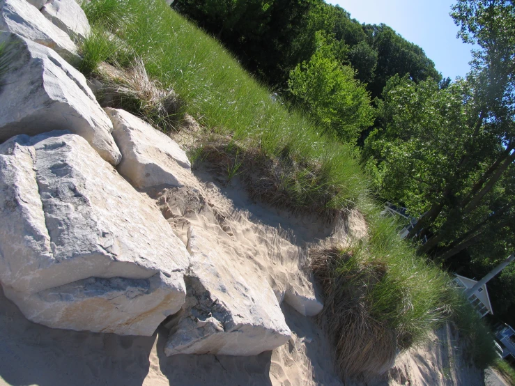 there are some big rocks that look like mounds of sand