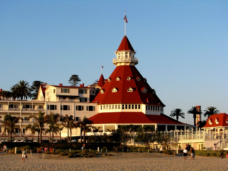 a view of a el with a red and white roof