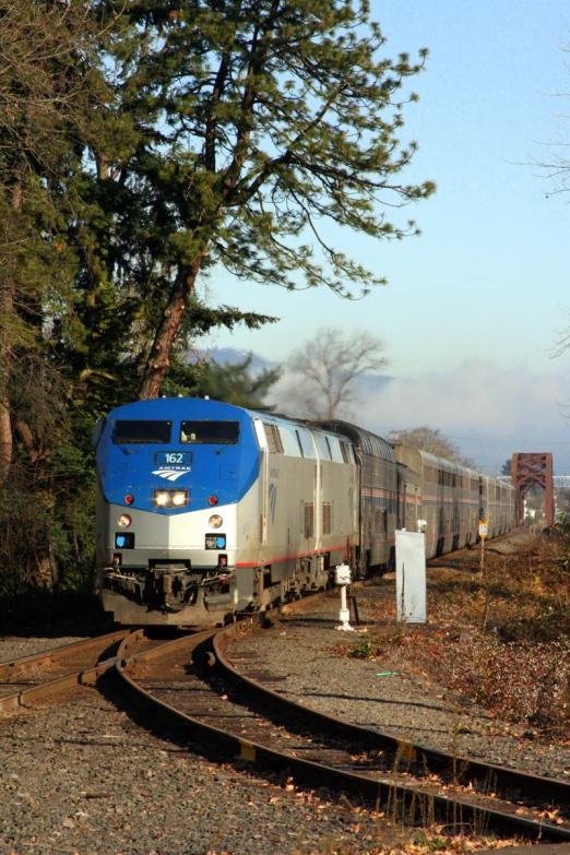 an image of train passing through a station