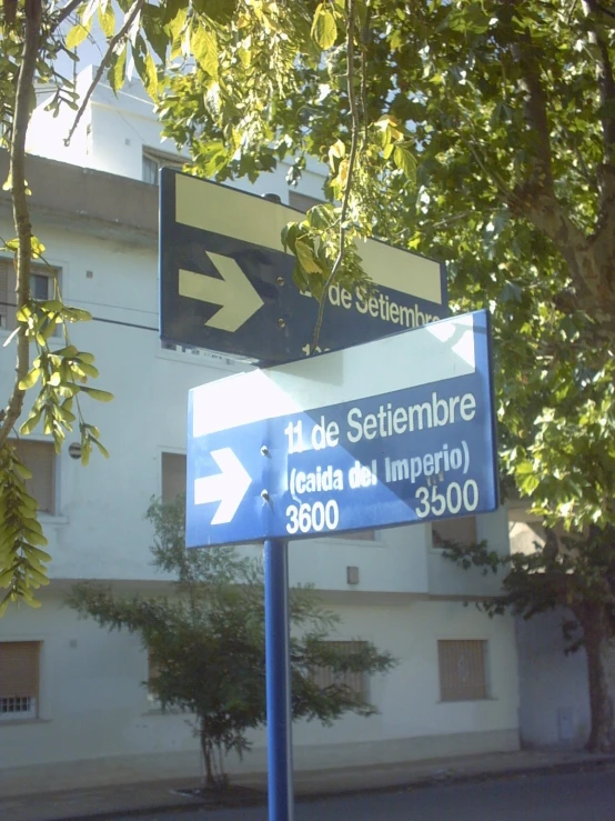 a directional sign and directions to different destinations