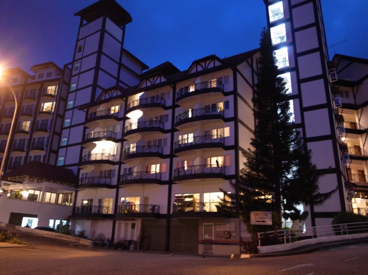 a large building with lights at night outside