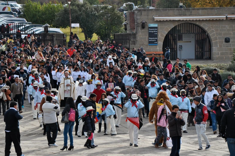 there is a huge crowd of people on the street