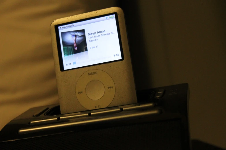 an ipod with a picture of a bird on it