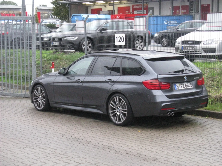 a car is shown sitting on the side of a road