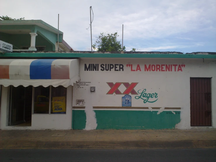 the storefront of an old, run down grocery