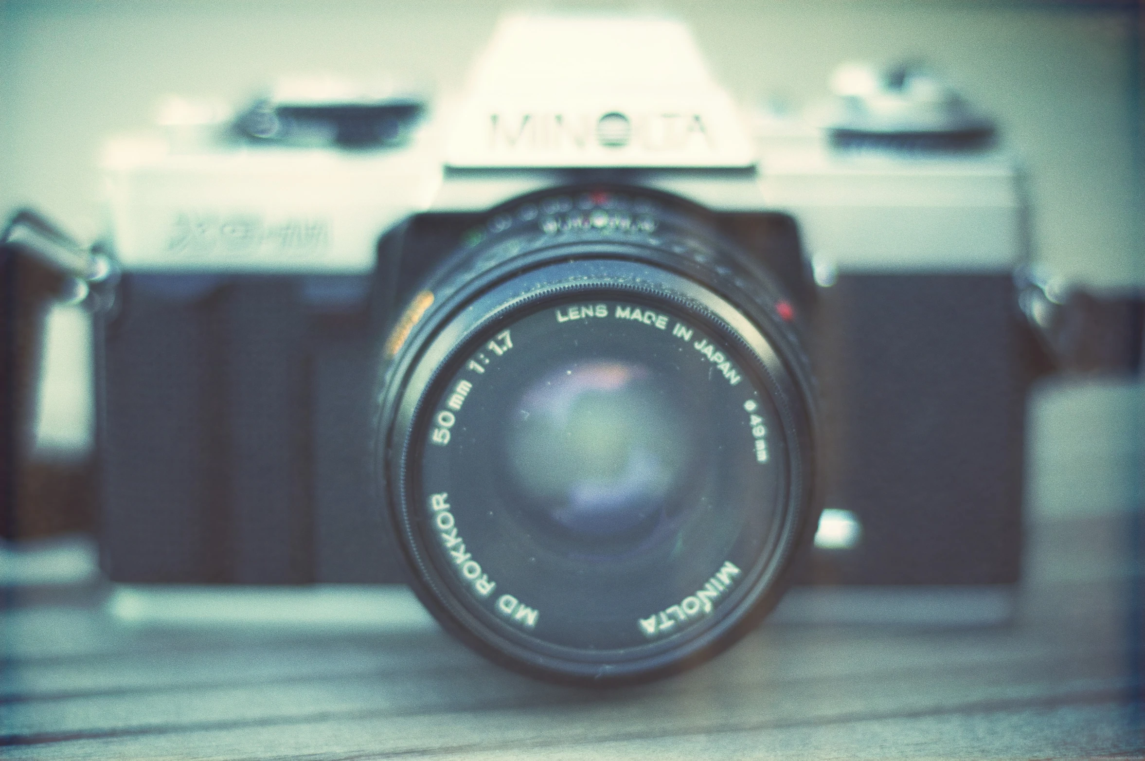 a camera that is sitting on top of a wooden table