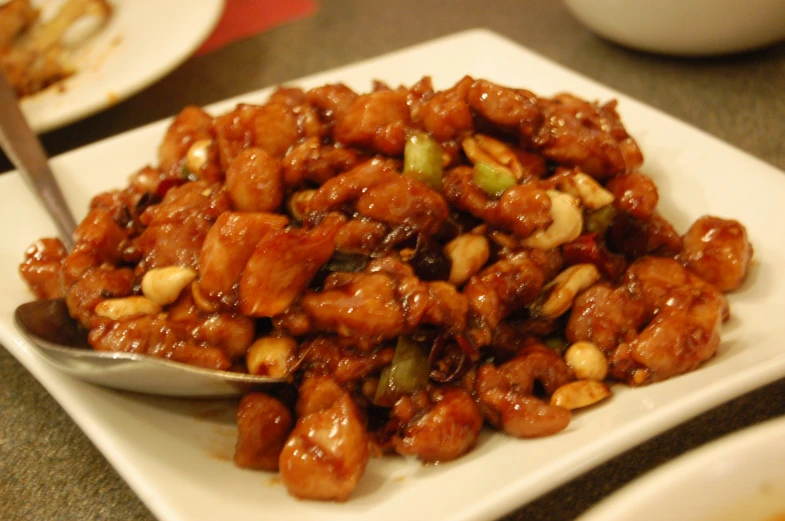 a plate filled with meat on top of a table