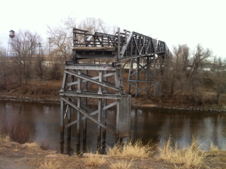 a water way going under an old bridge