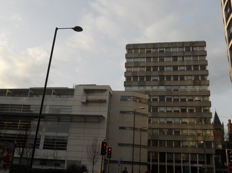 two large buildings sit near each other