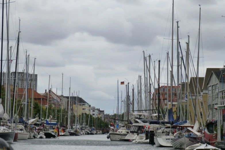 a line of boats that are on a body of water