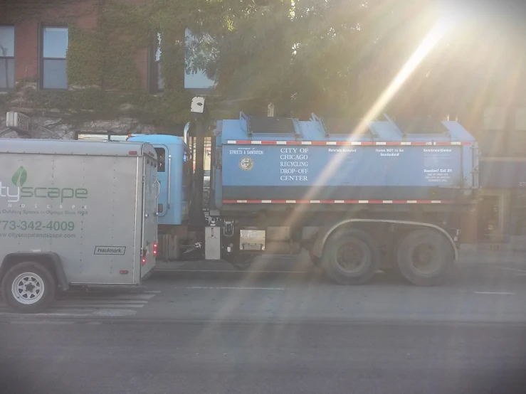 a truck parked in the parking lot next to a red brick building