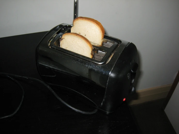 two slices of bread are placed inside a toaster