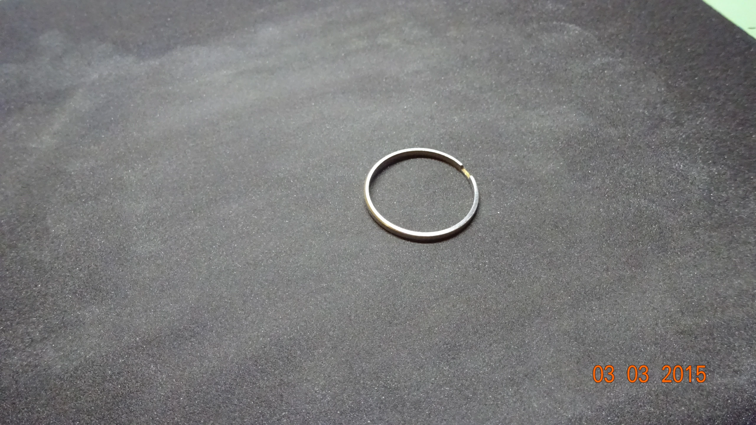 a close up view of a ring on a table