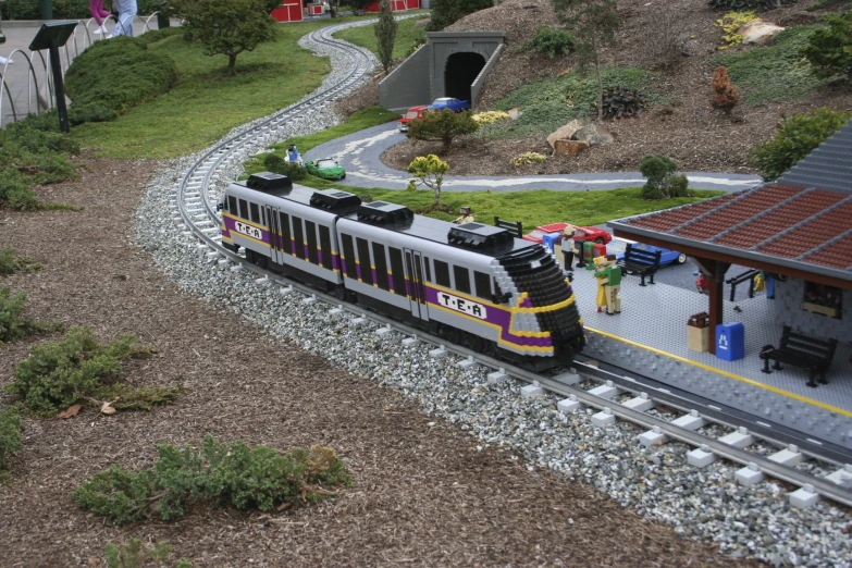 a train is moving around a small train track