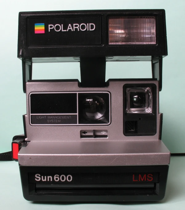 a polaroid camera with polaroid lenses is shown