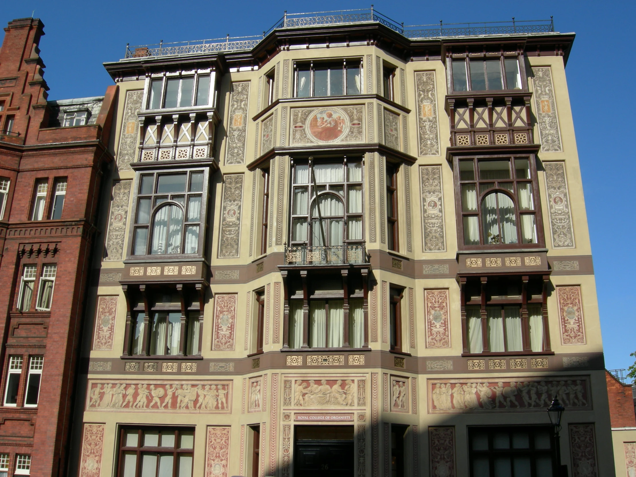 this is a tall building with ornate designs and windows