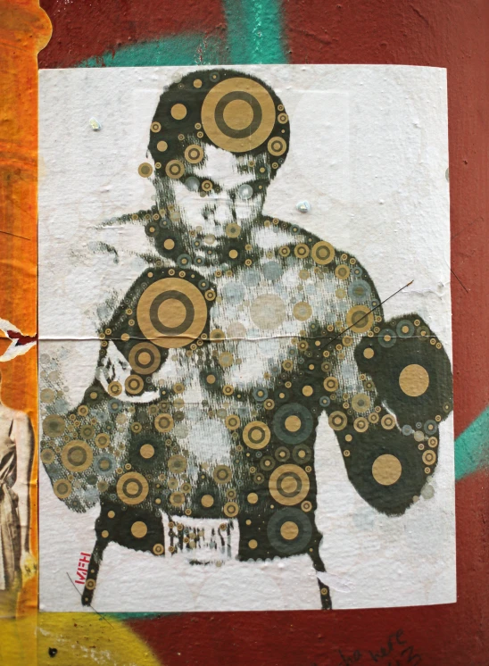 the painting is of a man in boxing gear