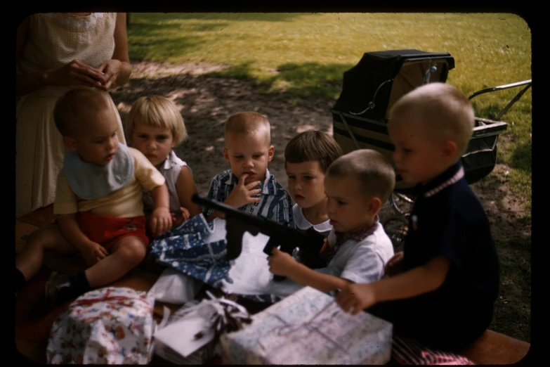 a group of small children with presents sitting in a wagon