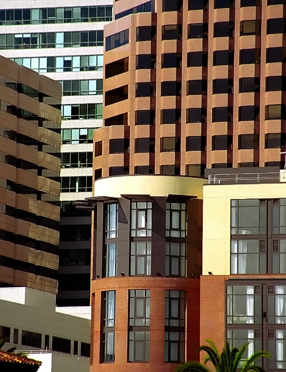 a tall building in the distance with lots of windows