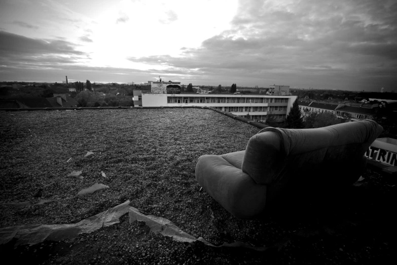 an abandoned house sitting out on top of a roof