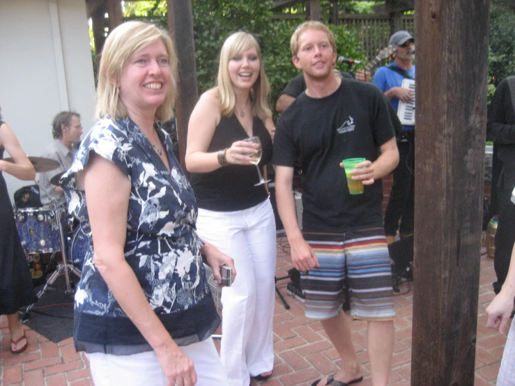 a group of people standing next to each other