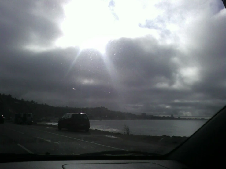 this is the front of a car on a rainy day