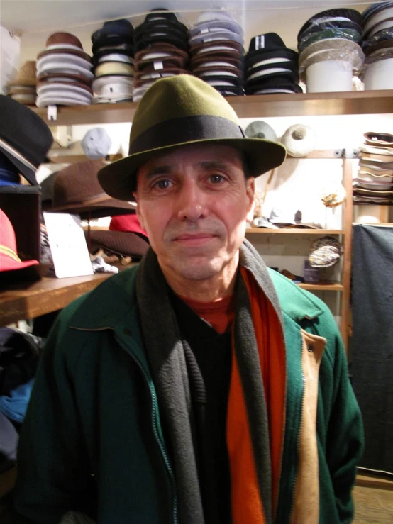 man with a hat in a hat store