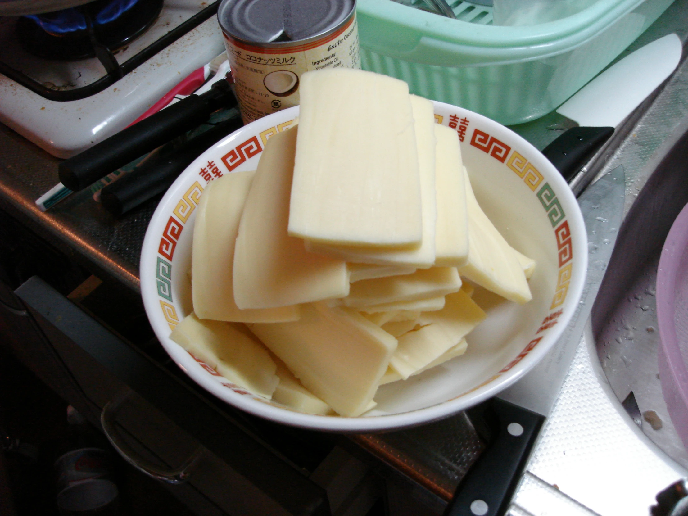 some slices of cheese in a white bowl