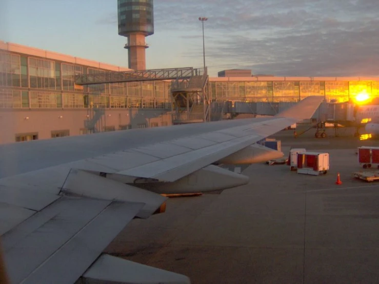 view out an airplane window during the sunset