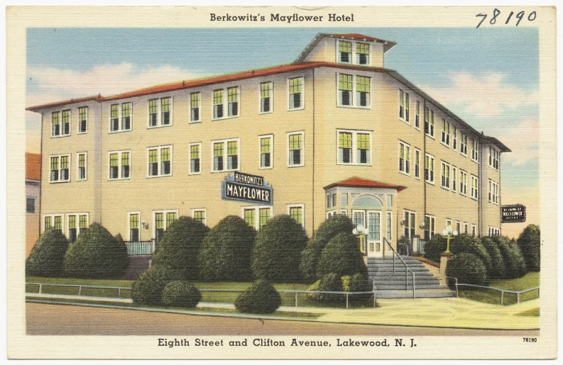 an old postcard features a two story el building