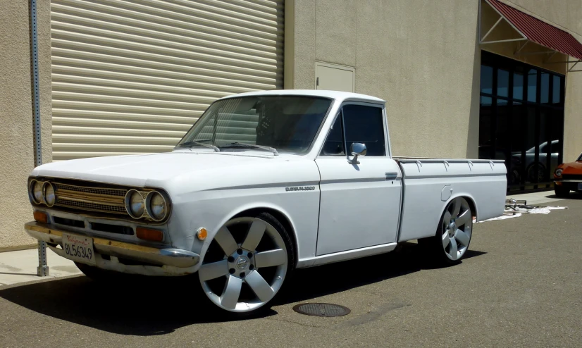 an old, classic ford truck parked on a street