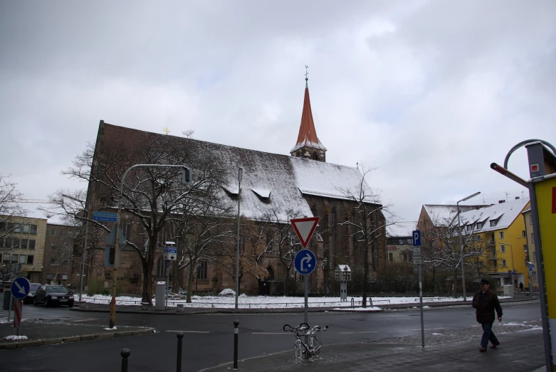 a building with a steeple on the roof of it