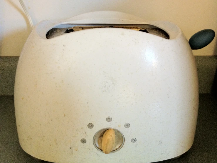 there is a toaster with holes in the side