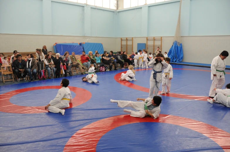 people on the ground in a competition during an open tournament