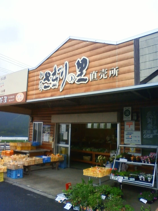 a small store with a building next to it