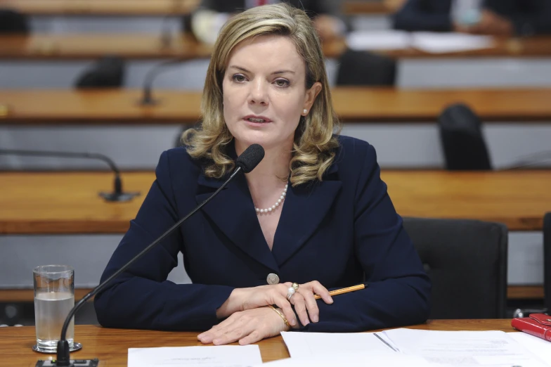 a female judge in a meeting looking forward